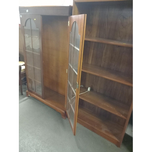 564 - A teak bookcase, glass fronted display cabinet, piano stool, footstool, side table and a bar stool