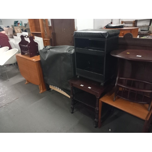 569 - A teak drop leaf dining table, side tables, magazine rack etc