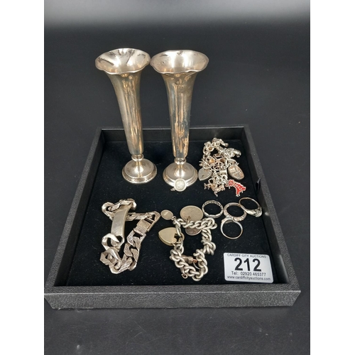 212 - A collection of silver jewellery (weight 163g) and a pair of weighted silver bud vaese