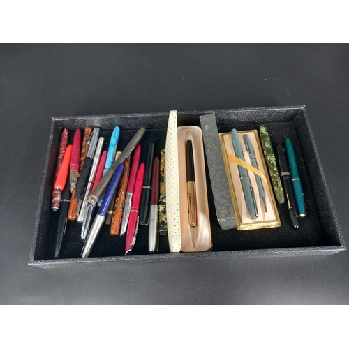 232 - A collection of vintage pens to include three with 14k gold nibs a Conway Stewart, a Swan 