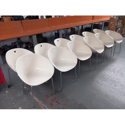 108 - Twelve white/cream Pidrali chairs