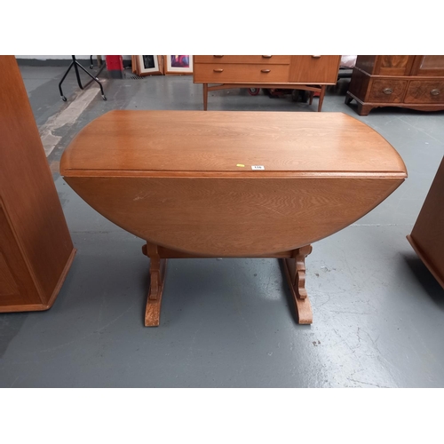 116 - An ercol drop leaf dining table