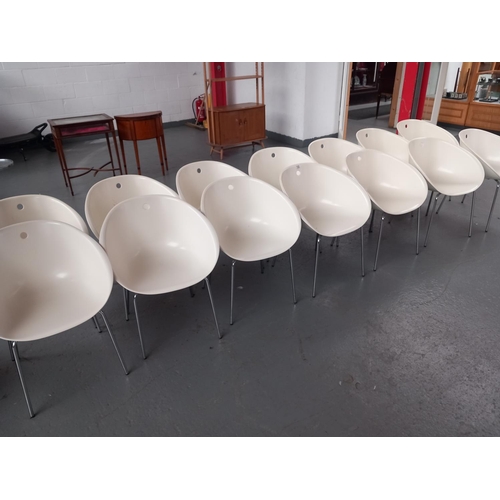 122 - Fourteen white/cream pidrali chairs