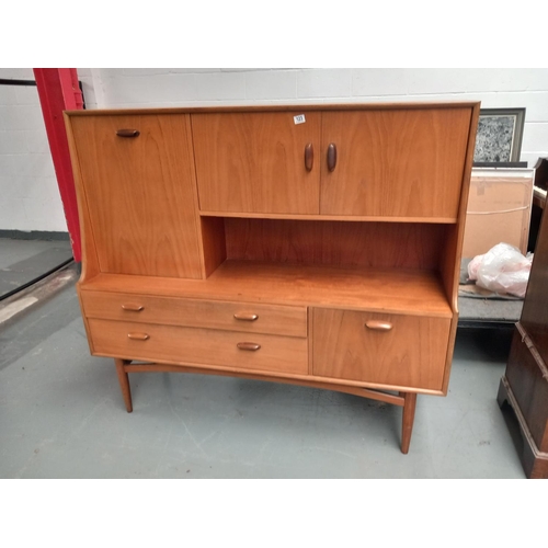 123 - A teak highboard