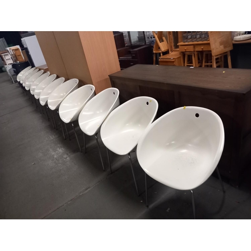 573 - 24 Pedrali tub chairs