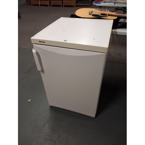 587 - A Miele under counter fridge