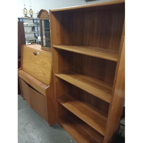 593 - A teak bureau, bookcase and small display cabinet