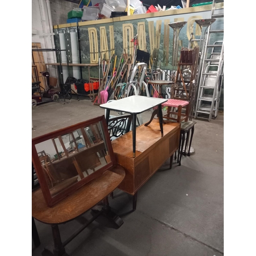 608 - An oak coffee table, two standard lamps, radiogram etc