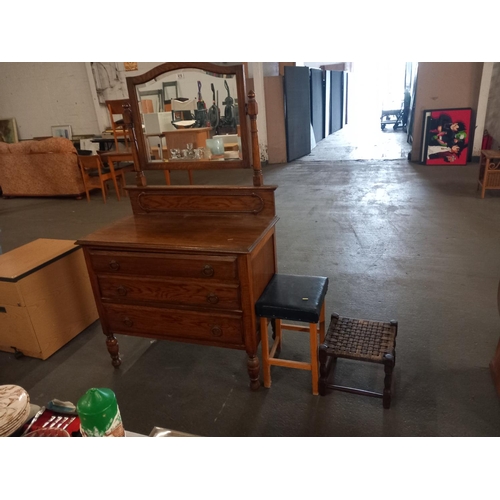 616 - An oak dressing table with mirror and two stools