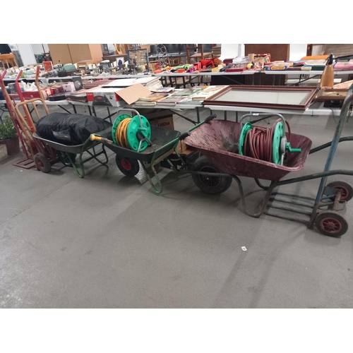 622 - Three sack trucks, three wheelbarrows, two hose reels and caravan awning