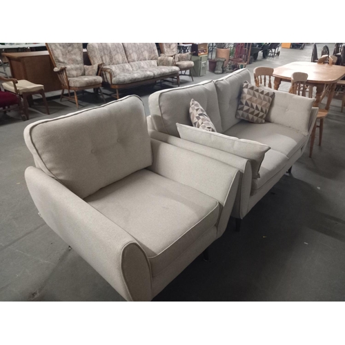 632 - A fabric two seater sofa and matching chair