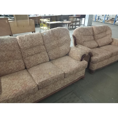 639 - A floral patterned fabric three seater and two seater sofas