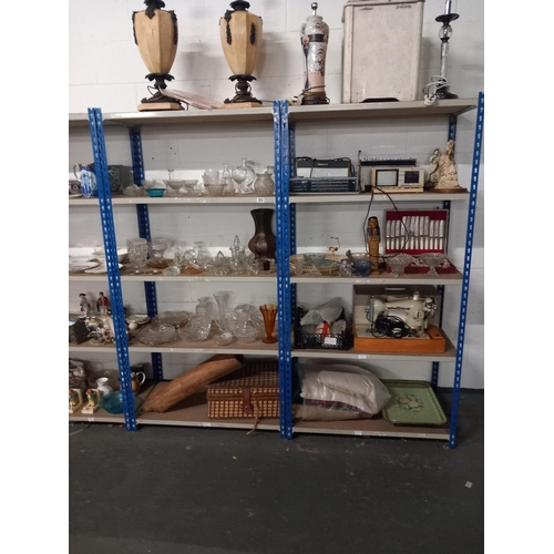 653 - 10 shelves of mixed household items to include lamps, cutlery set, sewing machine etc