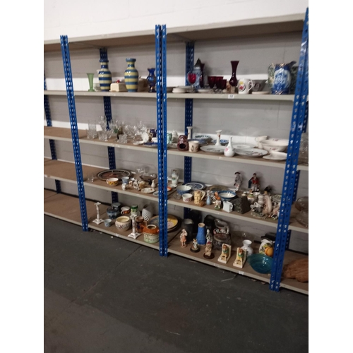 654 - Eight shelves of decorative china to include figurines etc