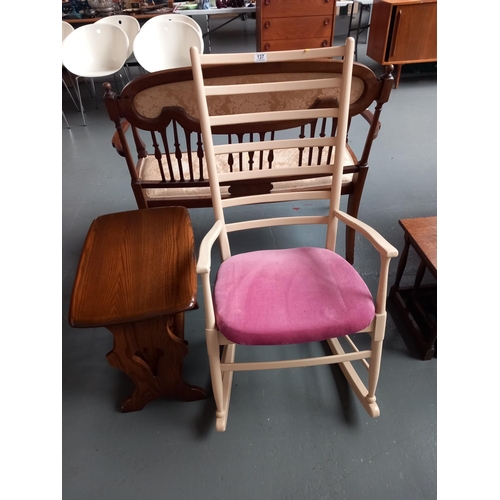 137 - An Ercol magazine rack/side table and Danish rocking chair