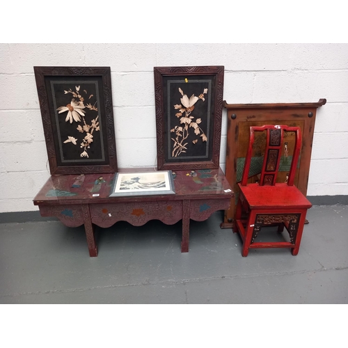 144 - A chinoserie chair, glass top table and four oriental pictures