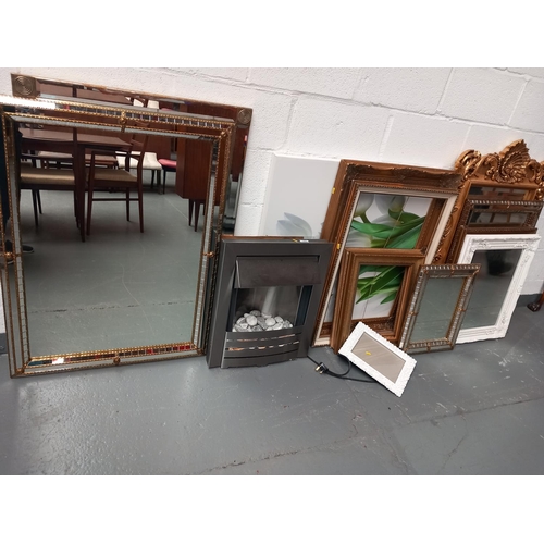 145 - Selection of mirrors, frames, canvas  and electric fireplace