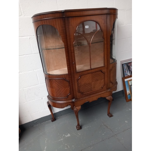 146 - A bow fronted glass china cabinet