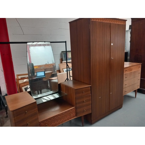 149 - A Uniflex bedroom suite consiting of wardrobe, chest of drawers and dressing table with mirror