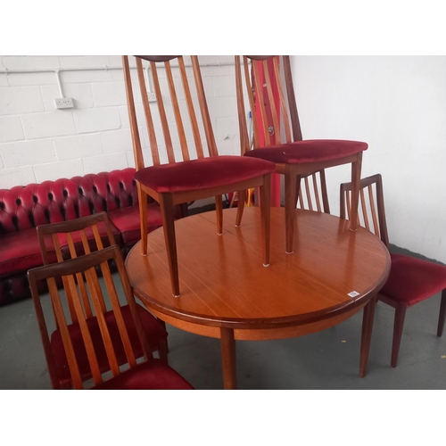 152 - A teak circular G Plan dining table and six chairs