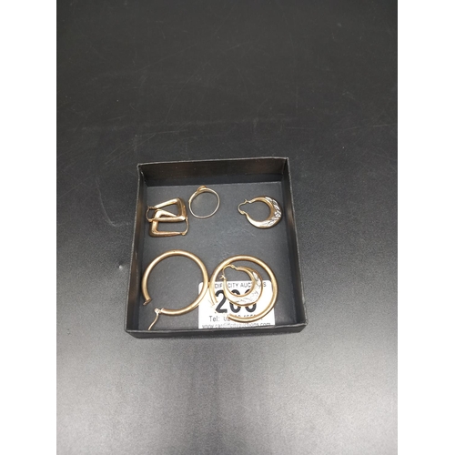 206 - Three pairs of 9k gold earrings and a small buckle ring (combined weight 4.7 grams)