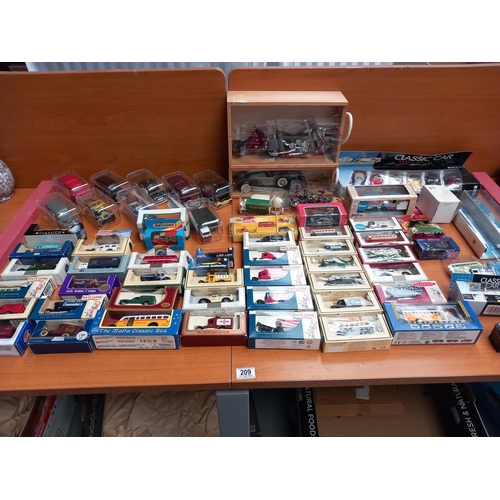 209 - Selection of mostly boxed Diecast model cars and ships