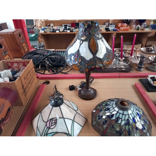 221 - A Tiffany style table lamp together with a Tiffany style lampshade and ceiling light