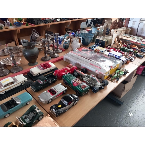 222 - A selection of model Burago cars, vintage vehicles tins, Scaletric set together with Ladybird and Ob... 