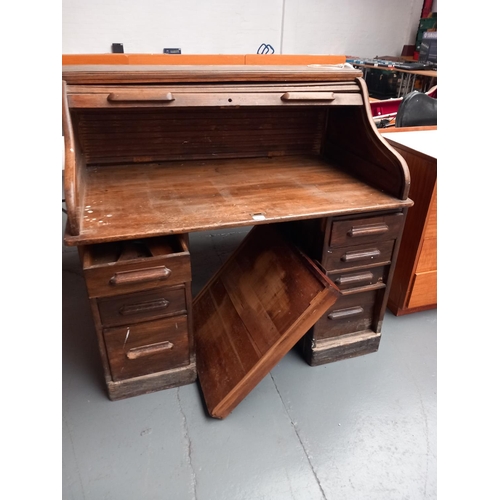 311 - An oak roll top desk