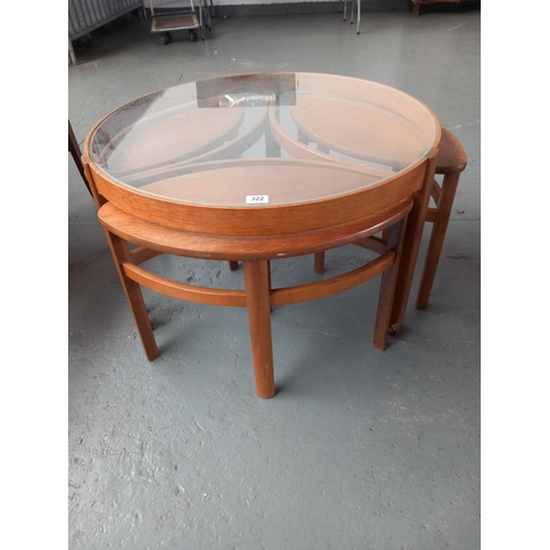 322 - A Nathan Trinity glass topped circular nest of tables