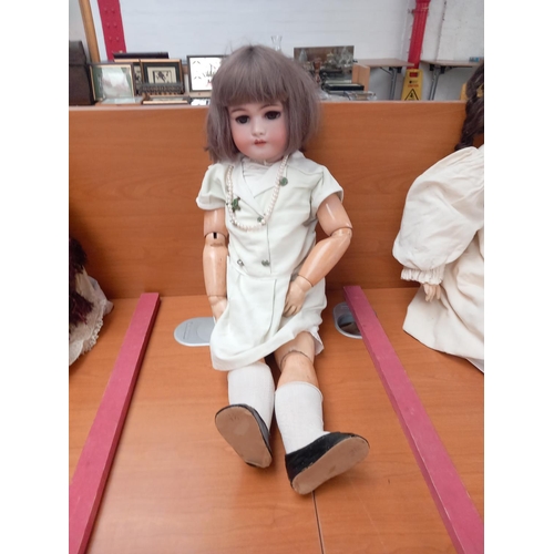 233 - An antique doll (bisque head and composite body) marked Simon and Halbrig 1078 - measuring 29 inches... 