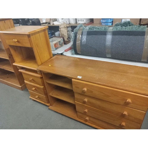535 - A pine sideboard together with two single pine bedside cabinets