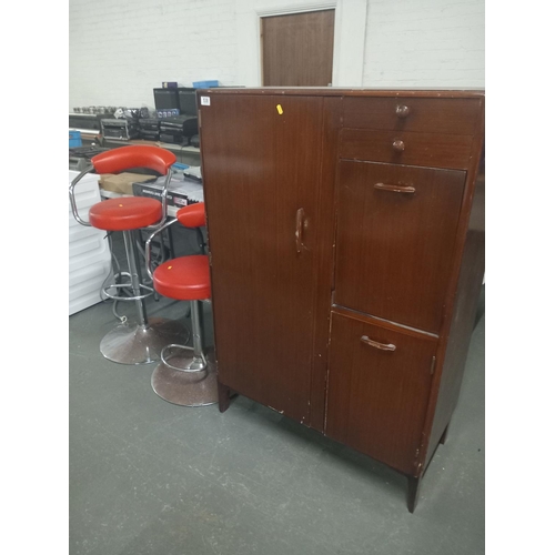 538 - Two adjustable red and chrome bar stools along with a remploy bedroom compactum