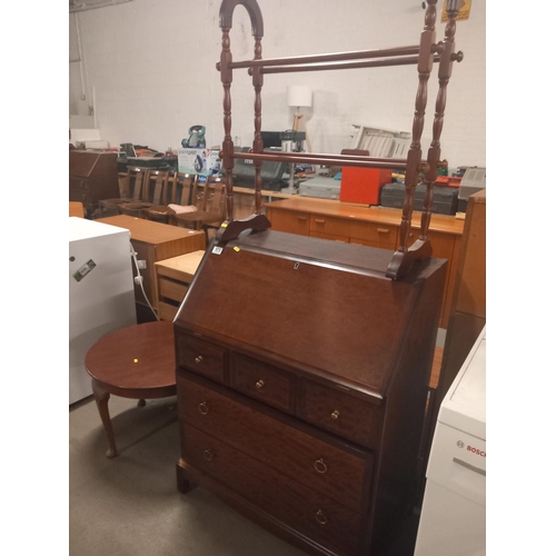 573 - A mahogany  bureau, circular coffee table and towel rail