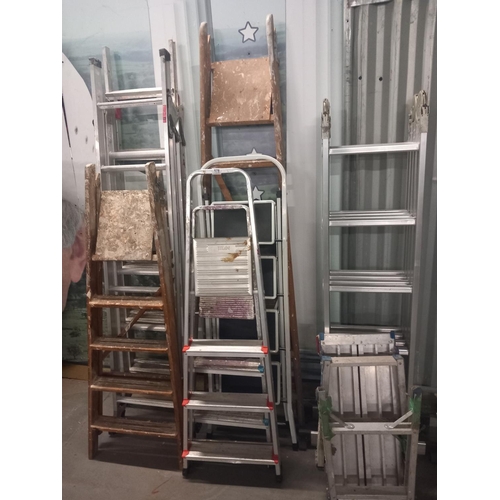 578 - Seven aluminium step ladders and two wooden step ladders