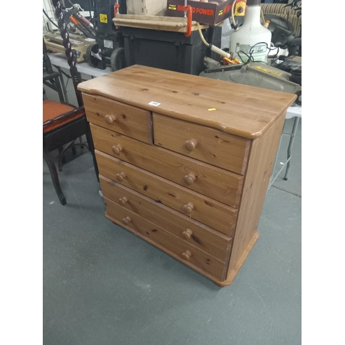 586 - A pine four draw chest of drawers