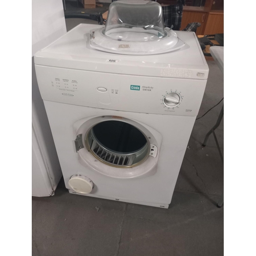 606 - A Creda tumble dryer (door needs repair)