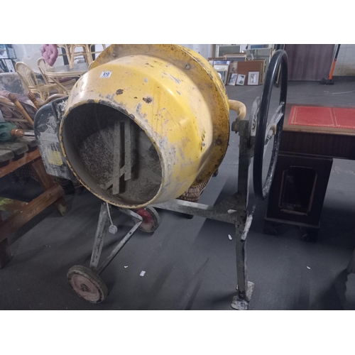 610 - A cement mixer on stand