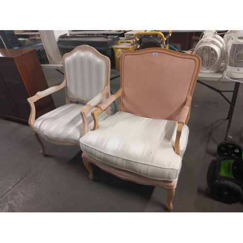 626 - Two reproduction french style upholstered arm chairs