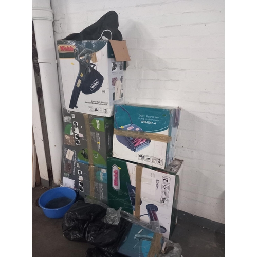 642 - Boxed gardening equipment to include a Webb vacuum, push mower, garden blower  etc