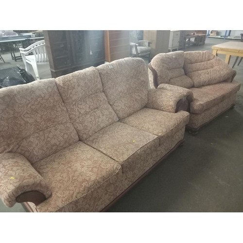 645 - A floral patterned fabric three seater and two seater sofas