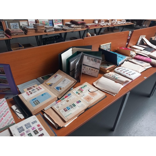 239 - A large collection of World stamps and First Day covers