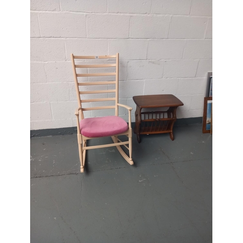 330 - An Ercol magazine rack/side table and Danish rocking chair