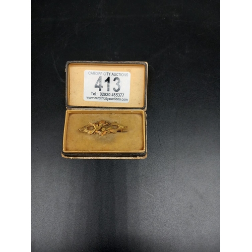 413 - A 9k gold Sweetheart brooch in original box (weight 1.3 grams)