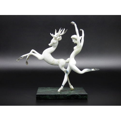 19 - Istvan Komaromy, large figural lamp worked prancing stag and dancing lady mounted on a green marble ... 