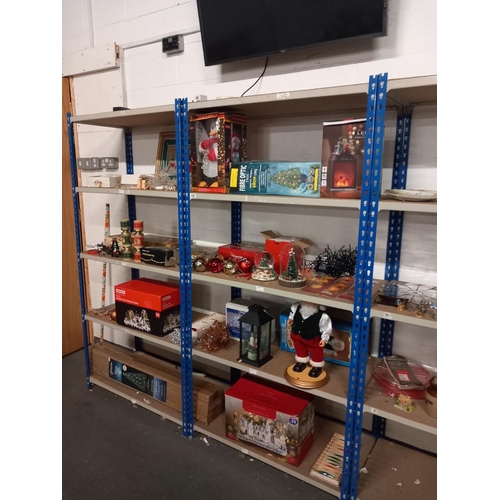 650 - 8 shelves of  christmas related items to include nativity set, baubles, christmas trees, dancing san... 