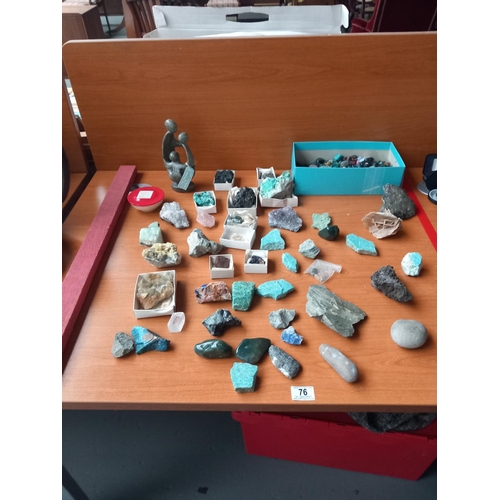 76 - A collection of geodes and a carved stone figure