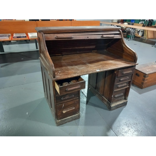 113 - An oak roll top desk