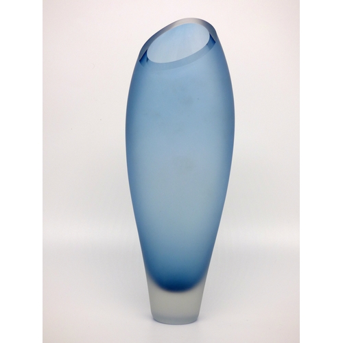 50 - A sculptural tall blue glass vase with satin finish designed by Catherine Hough.

Engraved signature... 