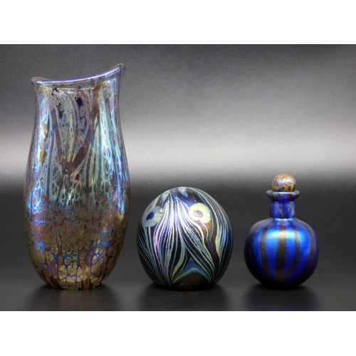 74 - Norman Stuart Clarke, an iridescent vase and perfume bottle, together with an iridescent paperweight... 